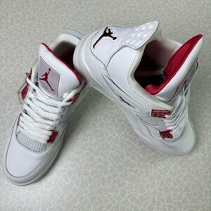 Man Jordan 4 White and Red Sneakers